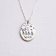 Load image into Gallery viewer, Silver pendant with birds soaring over a forest