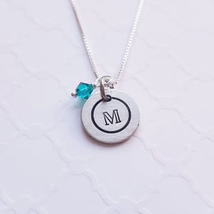 tiny disc necklace with stamped initial and swarovski birthstone