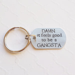 "damn it feels good to be a gangsta" funny dog tag keychain