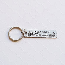 Load image into Gallery viewer, Silver bar keychain with mama and baby bear forest scene