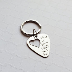 steel guitar pick keychain with heart cut out for 11th anniversary