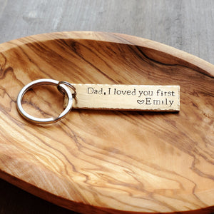 Bronze father-of-the-bride bar keychain reading "Dad, I loved you first"