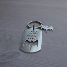 Load image into Gallery viewer, superhero dad dog tag keychain with cut-out name bats