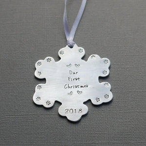 "our first christmas" snowflake-shaped christmas ornament with tiny hearts and year