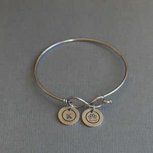 infinity bangle bracelet with stamped initial charms