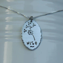 Load image into Gallery viewer, Silver oval pendant with dandelion and &quot;wish&quot;