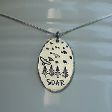 Load image into Gallery viewer, Silver pendant with birds soaring over a forest